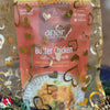Anar Gourmet Foods golden organza bag with heart pattern — Butter Chicken seasoning blend packet shown inside