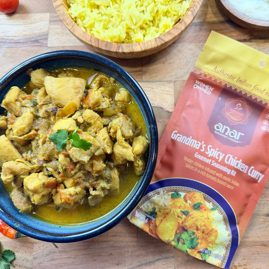 Anar Gourmet Foods, all natural, gluten-free grandma's spicy chicken curry seasoning and recipe, bowl of cooked chicken curry with yellow rice