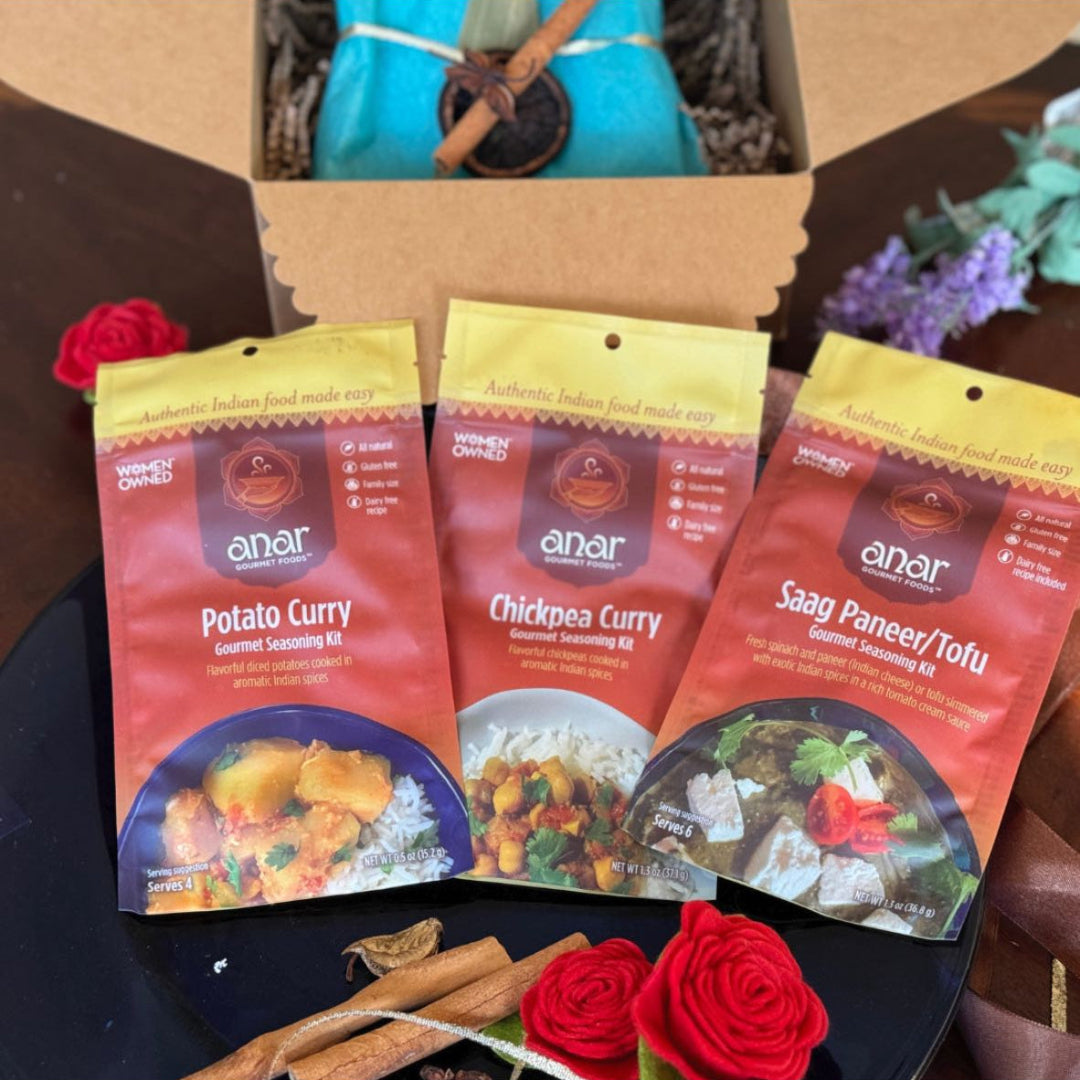 Anar Gourmet Foods vegetarian seasoning blends gift box — Potato Curry, Chickpea Curry, and Saag Paneer/Tofu packets with cinnamon and rose decorations