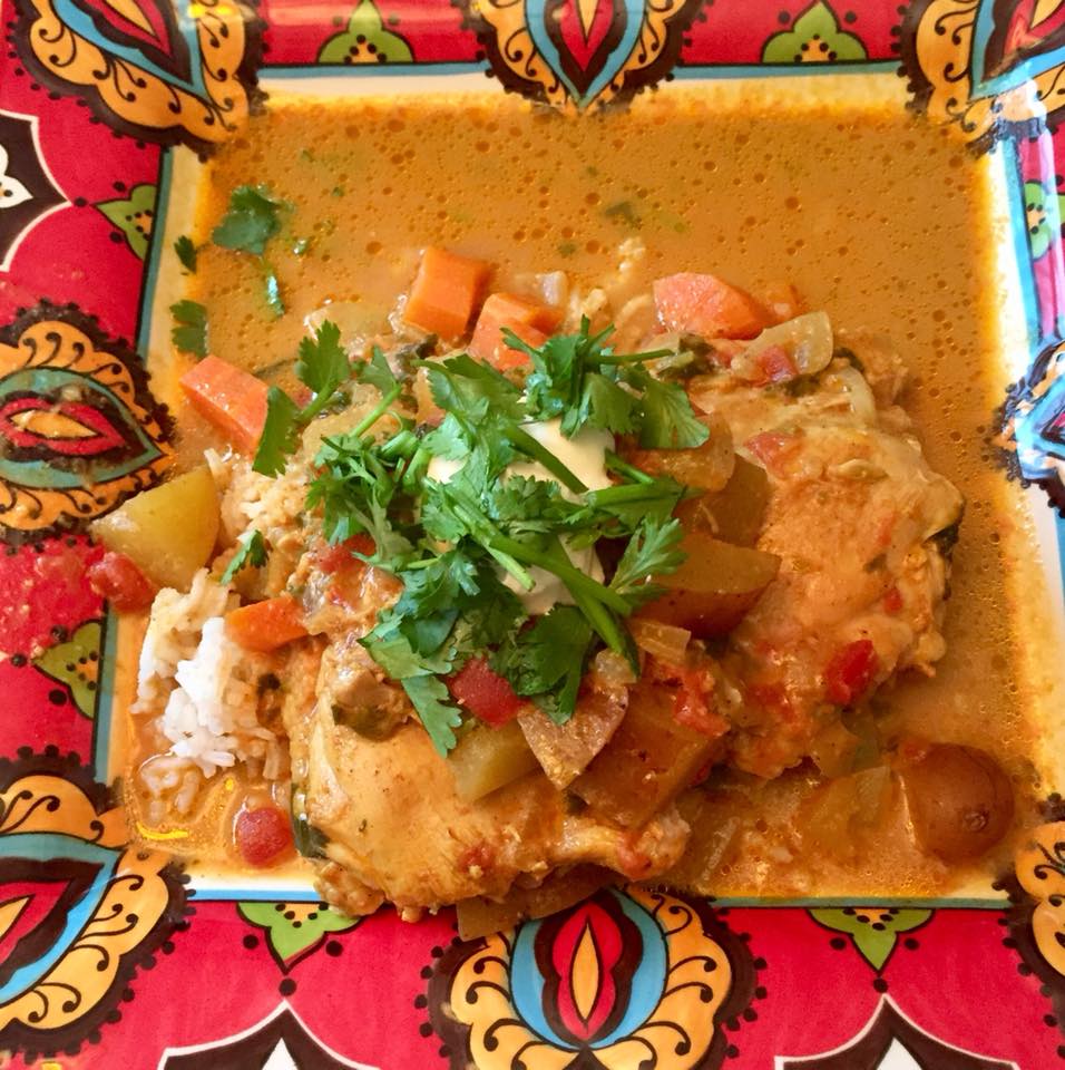 Anar Gourmet Foods all-natural, gluten-free lamb curry seasoning, made by customer Valerie T. and Carly S — served with rice, garnished with cilantro