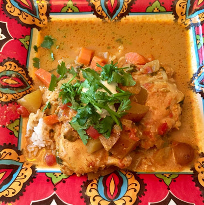 Anar Gourmet Foods all-natural, gluten-free lamb curry seasoning, made by customer Valerie T. and Carly S — served with rice, garnished with cilantro