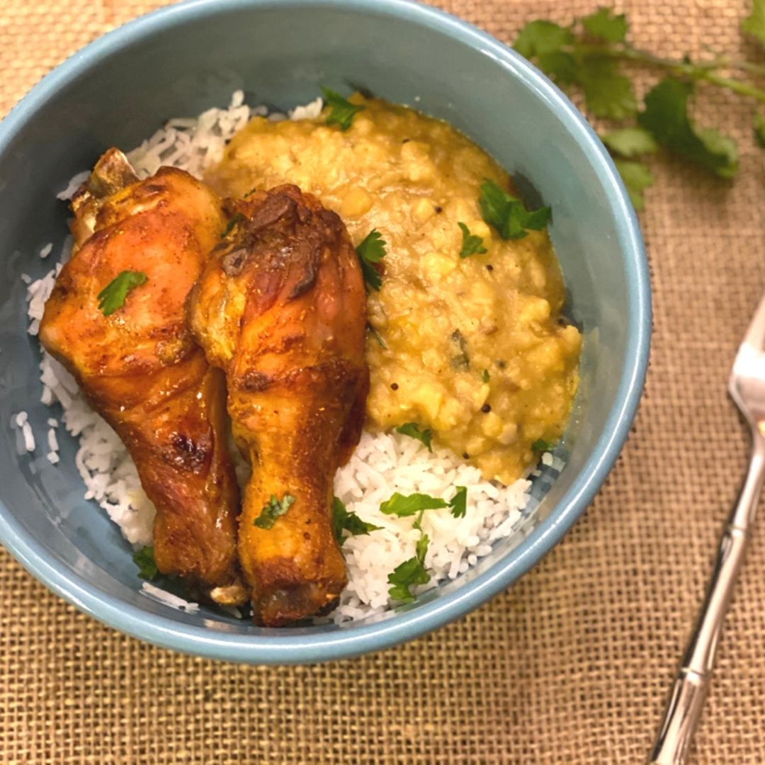 Anar Gourmet Foods lentil (dhal) soup served with rice and  baked chicken for a hearty meal