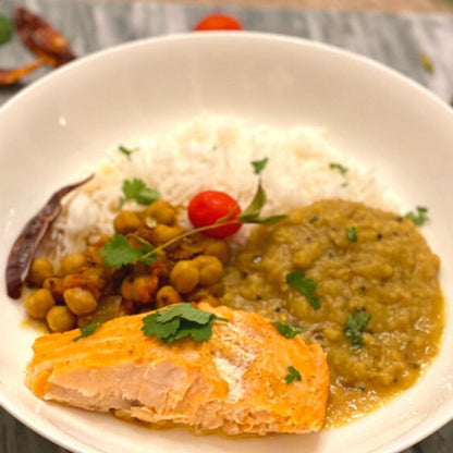 Anar Gourmet Foods lentil (dhal) soup served with rice, chickpeas, and salmon
