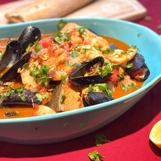Anar Gourmet Foods all-natural, gluten-free seafood curry with mussels, shrimp, and fish, garnished with cilantro