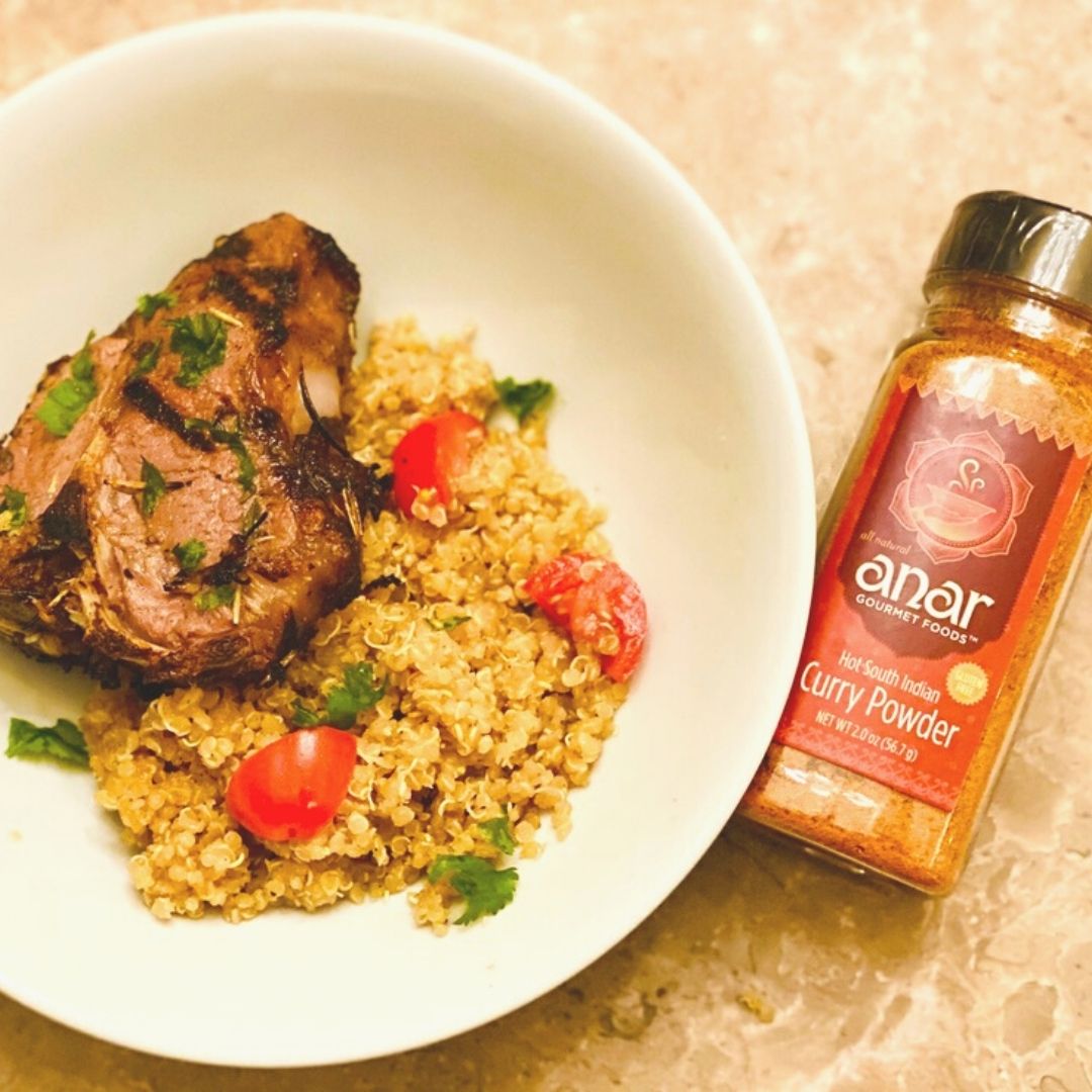 Anar Gourmet Foods all-natural South Indian hot curry powder — grilled lamb chop with quinoa, bottle shown alongside