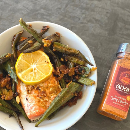 Anar Gourmet Foods all-natural South Indian hot curry powder — seasoned baked salmon and okra with lemon, bottle shown alongside