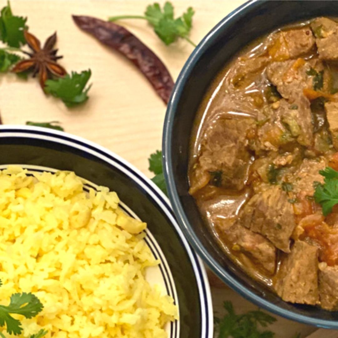 Anar Gourmet Foods all-natural, gluten-free spicy beef curry, served with coconut rice and whole spices